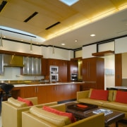view of kitchen from family area featuring, lighting, ceiling, interior design, lobby, brown