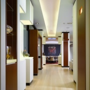 view of hallway with dining room in the ceiling, floor, flooring, interior design, lobby, brown, gray