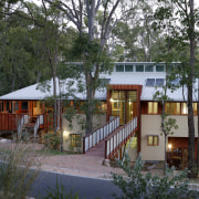 External view of sustainable house built by Natural architecture, cottage, home, house, property, real estate, tree, gray, black