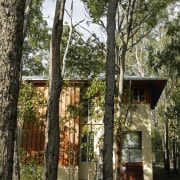 External view of sustainable house built by Natural cottage, home, house, outdoor structure, plant, tree, brown