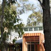 Exterior view of sustainable home built by Natural architecture, cottage, home, house, outdoor structure, plant, real estate, tree, black, white