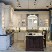 view of kitchen by Detail Kitchens featuring tiled cabinetry, ceiling, countertop, cuisine classique, interior design, kitchen, room, gray