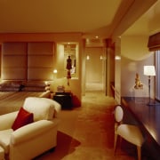 view of master bedroom featuring floor-to-ceiling headboard, walk-in architecture, ceiling, estate, interior design, living room, real estate, room, suite, brown