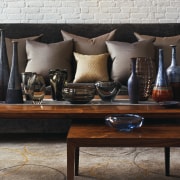 The owners ceramic collections include pieces by Italian coffee table, furniture, interior design, living room, table, black