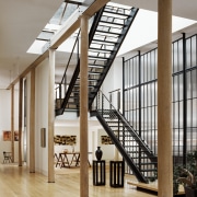 Part of the roof was replaced by a daylighting, handrail, stairs, structure, gray