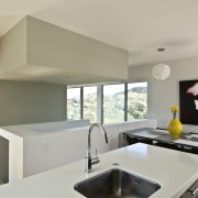 Kitchen inside contemporary home featuring cabinetry by AB architecture, countertop, home, house, interior design, kitchen, property, real estate, gray