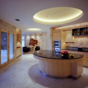 view of kitchen featuring island, tiled floor, wall ceiling, countertop, estate, floor, flooring, interior design, kitchen, lighting, lobby, real estate, room, gray