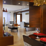 view of the front door and living room ceiling, floor, flooring, hardwood, interior design, living room, lobby, room, suite, wood, wood flooring, brown