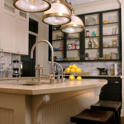 view of kitchen showing lights, cabinetry, countertop, sink cabinetry, ceiling, countertop, cuisine classique, interior design, kitchen, gray, brown