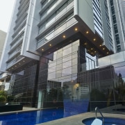 Lumiere Residences contemporarly apartment building outdoor swimming pool apartment, architecture, building, commercial building, condominium, corporate headquarters, daylighting, facade, glass, headquarters, hotel, metropolitan area, mixed use, property, real estate, skyscraper, swimming pool, window, gray, black
