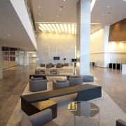 Views of the Axa Insurance Building developed by architecture, ceiling, daylighting, furniture, interior design, lobby, gray, brown