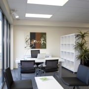 Grey Office chaairs with white laminate tale and ceiling, daylighting, furniture, interior design, office, real estate, table, gray, white