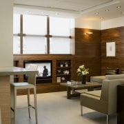 View of a kitchen designed and built by dining room, flooring, furniture, interior design, living room, lobby, room, brown, gray