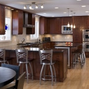 View of kitchens remodelled by Apex Kitchen and cabinetry, countertop, cuisine classique, floor, flooring, hardwood, interior design, kitchen, laminate flooring, room, wood, wood flooring, red, gray