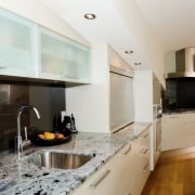 Kitchen inside contemporary home built by Absolute Build cabinetry, countertop, cuisine classique, interior design, kitchen, property, real estate, room, gray, white