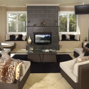 With the LCD television, the image colour and floor, furniture, hearth, home, interior design, living room, room, black