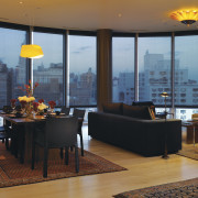 Contemporary lounge and dining room featuring Lutron Homeworks apartment, interior design, living room, real estate, table, window, brown