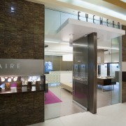 Image of Eyewear shop featuring cladding, cabinetry, tiled interior design, lobby, gray, brown