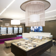 Image of Eyewear shop featuring cladding, cabinetry, tiled ceiling, interior design, white