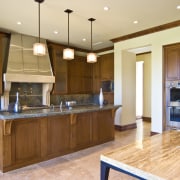 Kitchen wooden floors bench table fridge - Kitchen cabinetry, countertop, cuisine classique, flooring, hardwood, interior design, kitchen, real estate, room, wood flooring, orange, brown