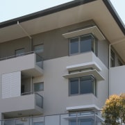 The building consists of 31 highly finished units apartment, architecture, balcony, building, commercial building, condominium, elevation, facade, home, house, property, real estate, residential area, siding, window, gray