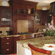 A more traditional look was specified for this cabinetry, countertop, cuisine classique, furniture, interior design, kitchen, room, red, brown