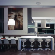 The strong horizontal lines of this kitchen enhance interior design, room, black, gray