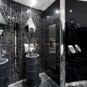 A decorative motif features throughout the interior. The black and white, flooring, interior design, black