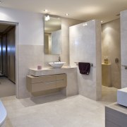 image of the bathroom which features his-and-hers vanities, bathroom, floor, interior design, real estate, room, gray