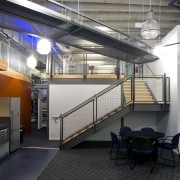 The exposed structural steel and building services in architecture, interior design, black, gray