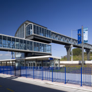 view of aluminium joinery designed and installed by architecture, bridge, building, corporate headquarters, fixed link, infrastructure, metropolitan area, overpass, road, sky, skyway, structure, blue