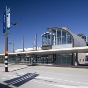 view of aluminium joinery designed and installed by airport, airport terminal, architecture, building, commercial building, corporate headquarters, fixed link, infrastructure, metropolis, metropolitan area, mixed use, sky, skyway, transport, blue, gray