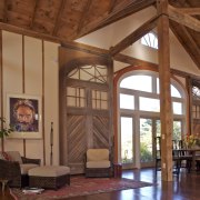 View of the front entrance way showing the beam, ceiling, estate, interior design, living room, lobby, real estate, wood, brown