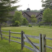 Exterior view of the house also showing the cottage, estate, farm, fence, grass, grassland, home, house, land lot, landscape, meadow, nature reserve, outdoor structure, pasture, path, property, real estate, rural area, split rail fence, tree, brown