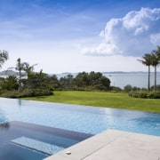 Image of the pool which has been designed arecales, caribbean, cloud, estate, leisure, ocean, palm tree, property, real estate, reflection, resort, sea, sky, swimming pool, tree, tropics, vacation, water, teal, white