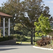 Single-and double-storey houses provide a variety of residential cottage, estate, facade, home, house, landscaping, neighbourhood, plant, property, real estate, residential area, suburb, tree, yard, brown, white