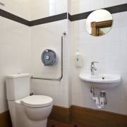 For this project, a family style cafe within bathroom, bathroom sink, bidet, ceramic, floor, interior design, plumbing fixture, product design, public toilet, purple, room, sink, tap, tile, toilet, toilet paper, toilet seat, wall, white