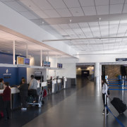 The entrance columns to the airport, standing like airport terminal, check in, infrastructure, institution, technology, gray