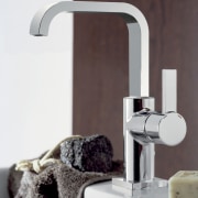 Grohe ceramic discs provide prescision operation. - Grohe plumbing fixture, product design, tap, white, red