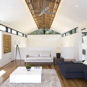 Modern lounge area with clerestory windows and vaulted architecture, ceiling, daylighting, house, interior design, interior designer, living room, real estate, white