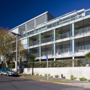 Image of aparments on Auckland's Nuffield St by apartment, architecture, building, commercial building, condominium, corporate headquarters, elevation, facade, headquarters, home, house, metropolitan area, mixed use, neighbourhood, property, real estate, residential area, blue