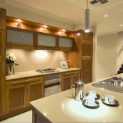 High ceilings, niche and cornice details and generous cabinetry, countertop, cuisine classique, interior design, kitchen, room, under cabinet lighting, brown, orange