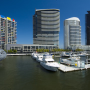 Clipsal's C-Bus lighting control systems and home automation architecture, building, city, cityscape, condominium, daytime, dock, downtown, marina, metropolis, metropolitan area, mixed use, real estate, reflection, sky, skyline, skyscraper, tower block, urban area, water, water transportation, waterway, black