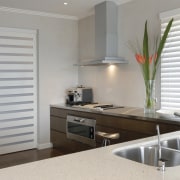 Cabinetry components from DK Design Kitchens are cut countertop, interior design, kitchen, gray