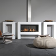 For ease of installation, Faber fires can be fireplace, furniture, hearth, home appliance, interior design, product design, table, wood burning stove, gray