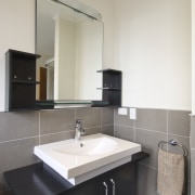 Bathroom Direct provided the turnkey renovation for this bathroom, bathroom accessory, bathroom cabinet, countertop, interior design, kitchen, property, real estate, room, sink, gray