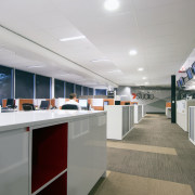 A viewing window in the meeting room looks interior design, office, gray