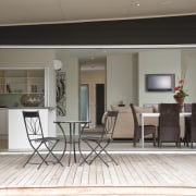 Location Homes asked designers Yellowfox to develop a door, floor, flooring, home, interior design, living room, property, real estate, window, gray, white