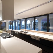 View of kitchen which features a kitchen island countertop, estate, interior design, gray