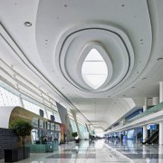 Ovoid forms and futuristic styling define the exhibition airport terminal, architecture, ceiling, daylighting, structure, gray
